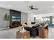 Spacious living room boasting a fireplace, modern decor, and ample natural light at 2751 Matera Dr, St Cloud, FL 34771