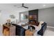 Inviting living room with modern fireplace, sleek furniture and plenty of space to entertain at 2751 Matera Dr, St Cloud, FL 34771
