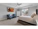 This main bedroom features a ceiling fan and scenic views at 2751 Matera Dr, St Cloud, FL 34771