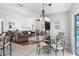 Open-concept dining and living area with a seamless flow and stylish decor at 3016 Samosa Hill Cir, Clermont, FL 34714