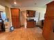 Bright kitchen offers wood cabinets, tile floors and ample room for appliances at 3327 Toasy Dr, Orlando, FL 32806
