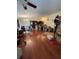 Spacious living room boasts hardwood floors, chandelier lighting and lots of space at 3327 Toasy Dr, Orlando, FL 32806