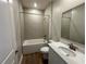 Well-appointed bathroom with a modern vanity, bathtub, and tiled walls at 4015 Maggie Loop, Lakeland, FL 33813