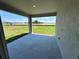 Covered patio offering a peaceful outdoor space with views of the backyard at 4015 Maggie Loop, Lakeland, FL 33813