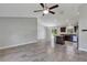 Open concept living area with tile floors and access to the kitchen at 4126 Sw 132Nd Ln, Ocala, FL 34473