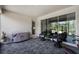Covered patio with comfortable seating and a barbecue at 4485 Renly Ln, Clermont, FL 34711