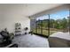 Covered patio with plants and a view of the backyard at 4485 Renly Ln, Clermont, FL 34711