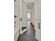 Bathroom with black tile floors and access to the bedroom and bathtub shower at 508 10Th St, St Cloud, FL 34769