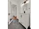 New vanity with modern fixtures and lighting, and a doorway to an adjoining room at 508 10Th St, St Cloud, FL 34769