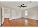 Bedroom features hardwood floors, fan, neutral paint, one window, and a closet at 508 10Th St, St Cloud, FL 34769