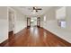 Bright living room with hardwood floors and french doors leading to other rooms at 508 10Th St, St Cloud, FL 34769