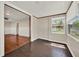 Bright sunroom with hardwood floors, beadboard, and plenty of windows with natural light at 508 10Th St, St Cloud, FL 34769