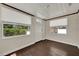 Inviting sun room with ample natural light, hardwood floors, and serene outdoor views at 508 10Th St, St Cloud, FL 34769