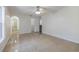 Bright bedroom featuring neutral tile floors and ceiling fan at 50989 Highway 27 # 371, Davenport, FL 33897