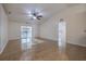 Spacious living room with vaulted ceiling and tile floors, offering ample natural light and an open layout at 50989 Highway 27 # 371, Davenport, FL 33897