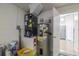 Utility area with water heater, HVAC system, and storage at 50989 Highway 27 # 371, Davenport, FL 33897