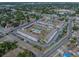 Wide aerial shot of the condo complex with convenient parking and meticulously maintained grounds at 5505 Hernandes Dr # 204, Orlando, FL 32808