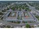 Comprehensive aerial view of the condo complex, highlighting community layout and surrounding greenery at 5505 Hernandes Dr # 204, Orlando, FL 32808