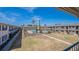 Aerial view of community featuring manicured lawn, mature trees, community pool at 5505 Hernandes Dr # 204, Orlando, FL 32808