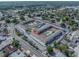 Expansive aerial perspective of the condo complex, showcasing its design and serene setting at 5505 Hernandes Dr # 204, Orlando, FL 32808
