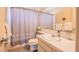 Neutral bathroom with a shower and tub combo, a single sink vanity and a neutral-colored theme at 5505 Hernandes Dr # 204, Orlando, FL 32808