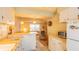 Bright kitchen featuring white cabinetry, modern appliances, and an open design at 5505 Hernandes Dr # 204, Orlando, FL 32808
