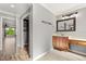 Bathroom featuring a vanity area, closet, and hardwood flooring in neutral color scheme at 618 Crownclover Ave, Orlando, FL 32828