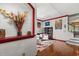 Charming entryway with decorative niche and views of the staircase at 618 Crownclover Ave, Orlando, FL 32828