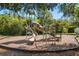 Community playground with a slide, climbing bars, and a cushioned surface for safe play at 618 Crownclover Ave, Orlando, FL 32828