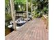 Dock and boat lift on a canal, offering convenient access to waterfront activities and serene views at 76 Oakdale St, Windermere, FL 34786