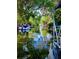 Scenic waterfront view showcasing a calm waterway surrounded by lush trees and parked boats at 76 Oakdale St, Windermere, FL 34786