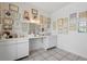 Bright room with white cabinets, white walls and tile floor, perfect for professional use or hobby space at 9915 Kona Isle Ct, Orlando, FL 32817