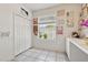 Bright room with white walls and tile floor, perfect for professional use or hobby space at 9915 Kona Isle Ct, Orlando, FL 32817