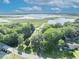Beautiful aerial shot showing lush greenery, water and the property at 1003 Shore Dr, Kissimmee, FL 34744