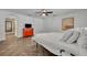 Neutral bedroom with modern furnishings, herringbone floors, and ample closet space at 1003 Shore Dr, Kissimmee, FL 34744