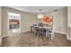 Dining room with stylish chandelier and view of office at 1003 Shore Dr, Kissimmee, FL 34744