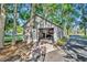 Large garage with car lift and ample storage space at 1003 Shore Dr, Kissimmee, FL 34744
