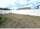 Fenced backyard offering privacy and space for outdoor activities at 10235 Summer Elm Ave, Clermont, FL 34711