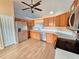 Bright kitchen with stainless steel appliances at 10235 Summer Elm Ave, Clermont, FL 34711