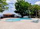 Community pool features comfortable lounge chairs for residents to relax by the water at 1156 Calle Del Norte # C, Casselberry, FL 32707