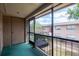 Patio with screened-in porch provides an outdoor space for relaxing while enjoying the community views at 1156 Calle Del Norte # C, Casselberry, FL 32707