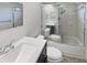 Bathroom featuring a shower-tub, toilet, and a modern vanity at 12610 Bay Hill Dr, Grand Island, FL 32735