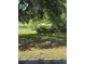Backyard featuring pond at 12822 Moss Park Ridge Dr, Orlando, FL 32832