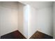 A simple walk-in closet with wire shelving and hardwood floors at 12822 Moss Park Ridge Dr, Orlando, FL 32832