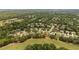 Expansive neighborhood showcasing a mix of homes nestled amidst lush greenery and mature trees at 1320 Antrim Cir, Ormond Beach, FL 32174