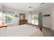 Bedroom featuring a sliding glass door with a view and comfortable decor at 1320 Antrim Cir, Ormond Beach, FL 32174