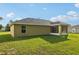 Rear exterior view with screened porch at 13489 Sw 60Th Avenue Rd, Ocala, FL 34473