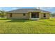Rear exterior view with enclosed porch at 13489 Sw 60Th Avenue Rd, Ocala, FL 34473