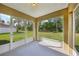 Enclosed porch with views of backyard at 13489 Sw 60Th Avenue Rd, Ocala, FL 34473