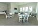 Spacious resident lounge with ample seating, tables, and large windows for natural light at 13617 Haulover Beach Ln, Orlando, FL 32827